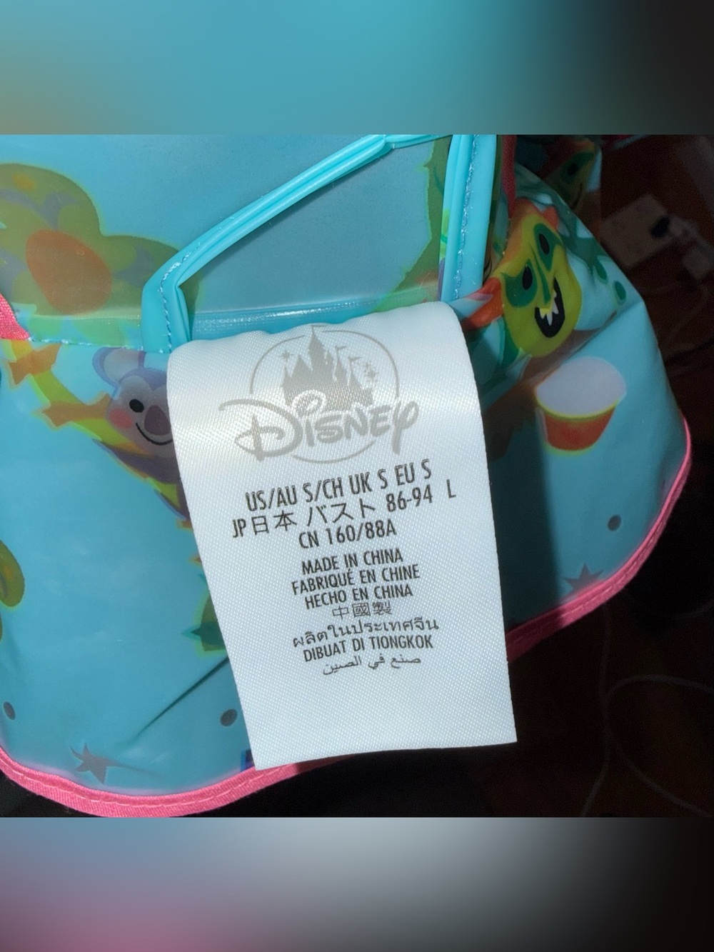 Disney Parks translucent blue “It’s a Small World” Raincoat, size S, EUC - Picture 6 of 6